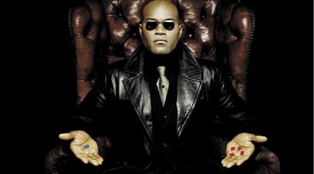 Morpheus from the Matrix, showing the red and blue pills.