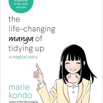 The Life-changing manga of tidying up: a magical story, by Marie Kondo, author of the life-changing magic of tidying up, illustrated by yuk uramoto. A graphic novel to spark joy in life, work, and love. Kondo is illustrated as a manga character with her finger pointed in the air and a smile on her face.