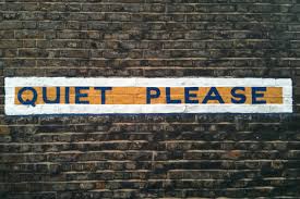 "Quiet Please" is written on Brick