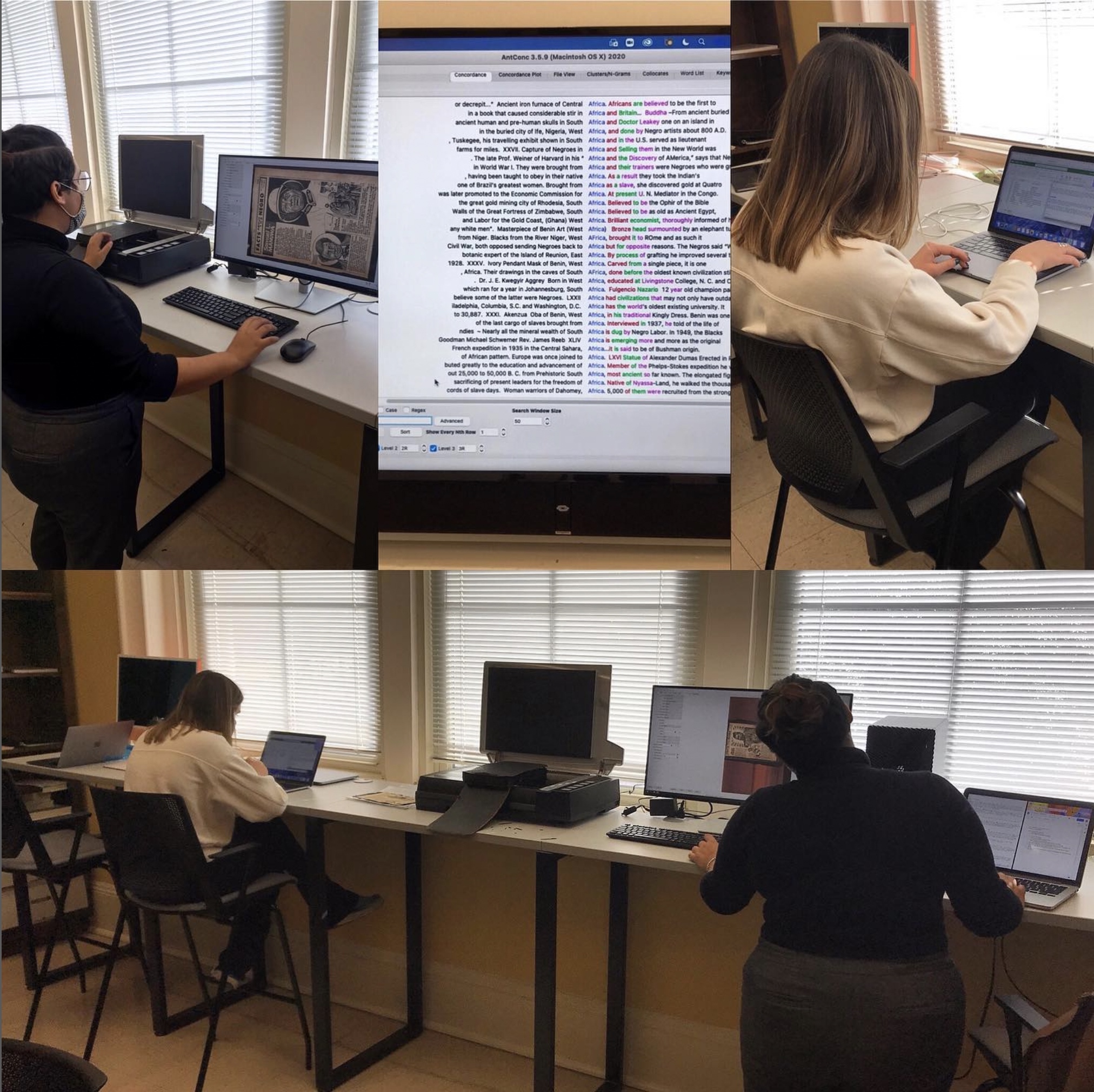 Two students are working at ocmptuer terminals scanning documents.