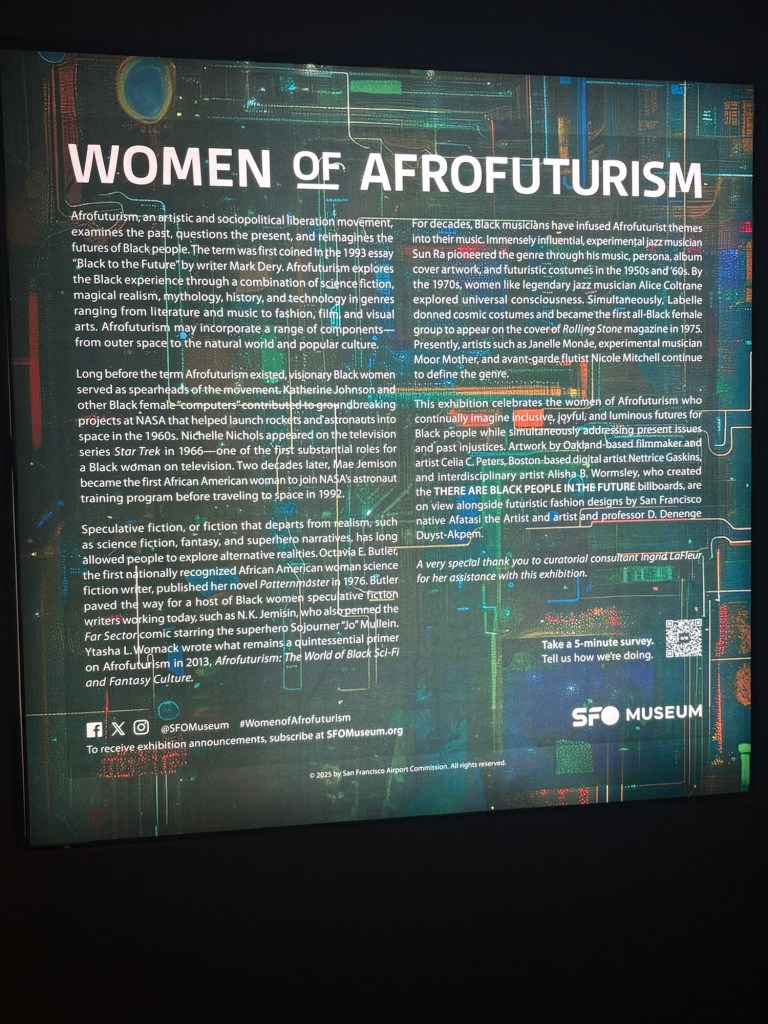 “Women of Afrofuturism” wis the title of this image. There’s text too small to read. The background is a cosmos-looking microchip.